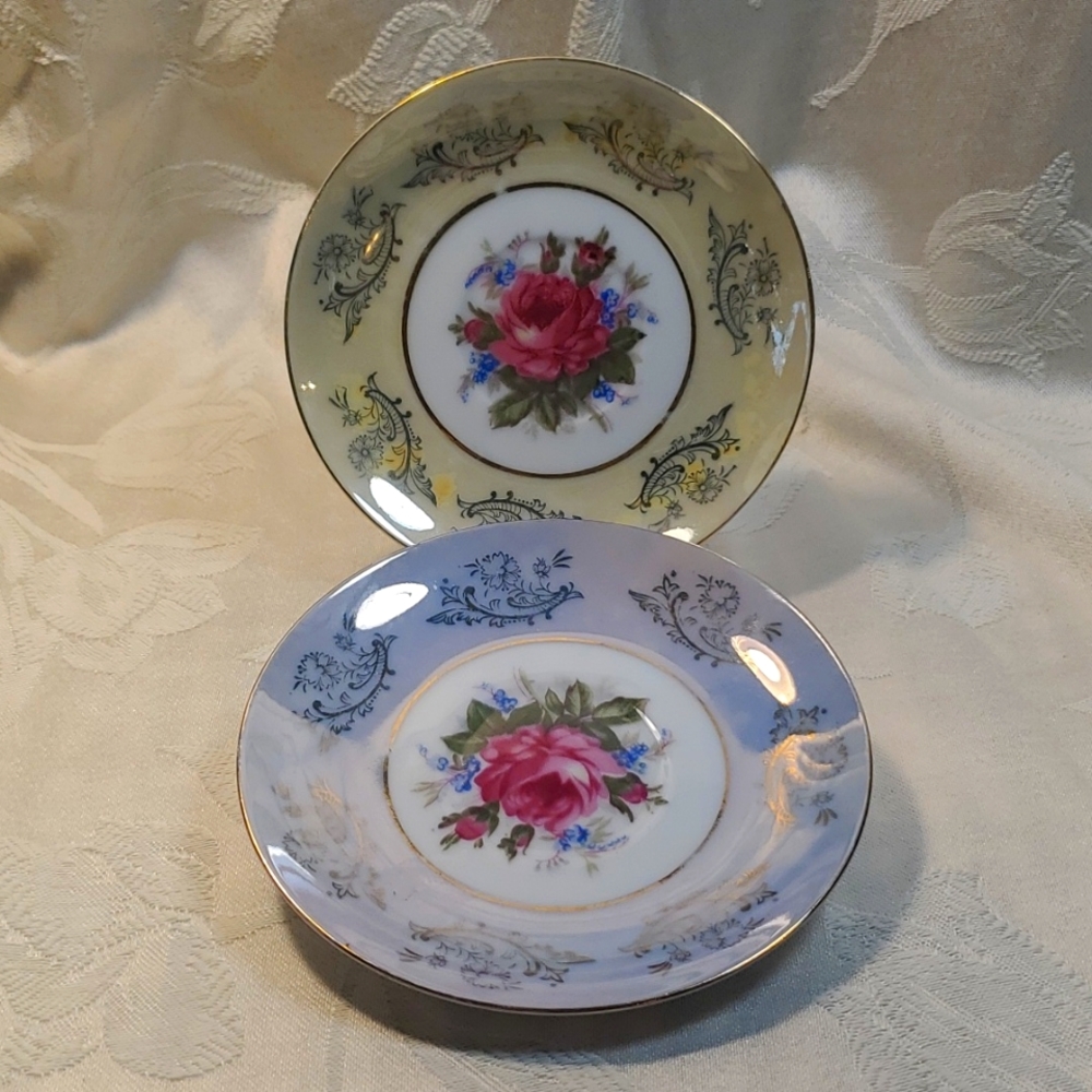 Pair of ROYAL HALSEY saucers